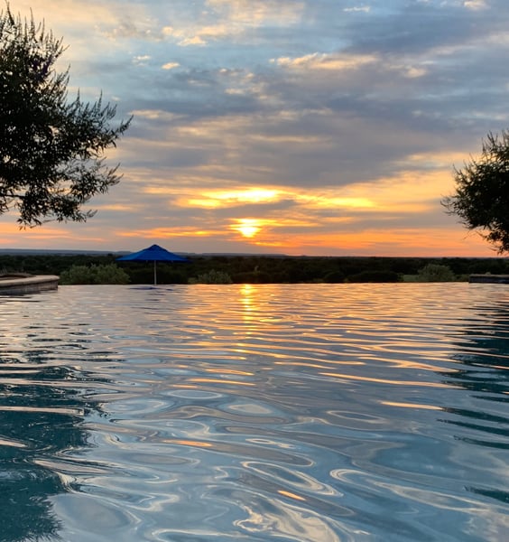 The sun setting over the Hideout pool