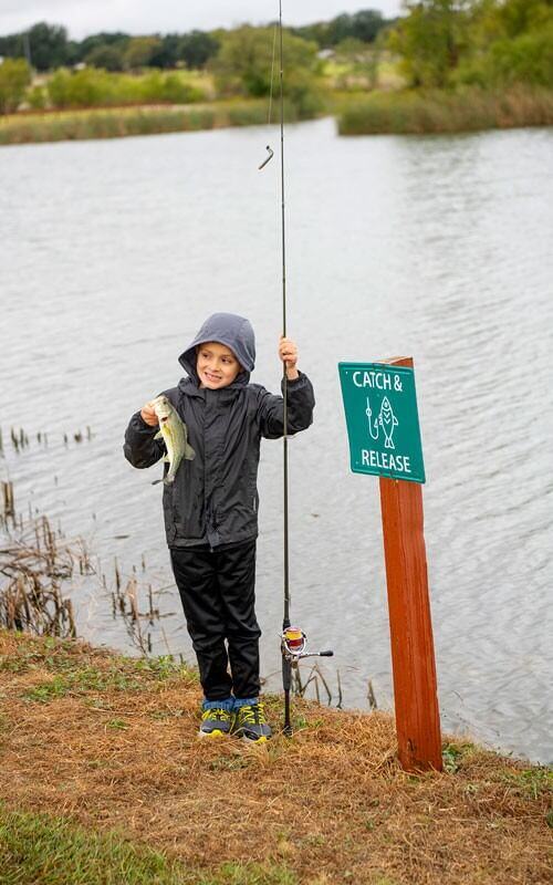 Little boy caught a fish
